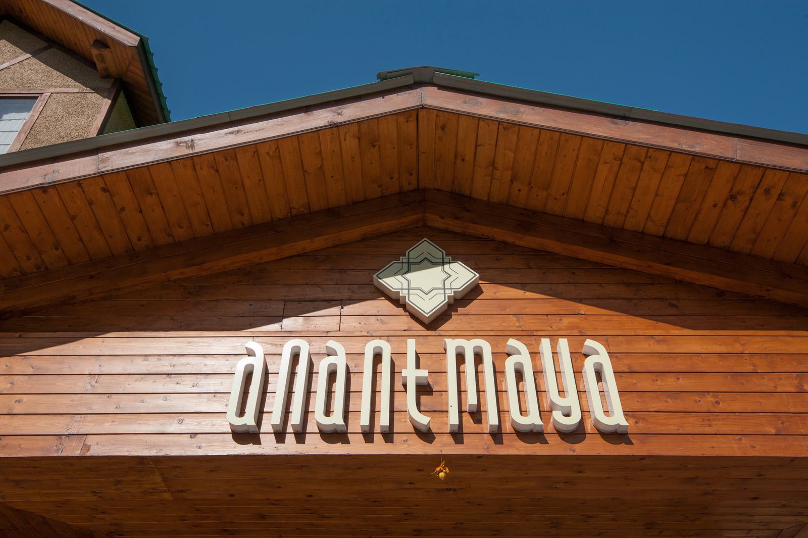 The Anantmaya name on the timber entrance porch