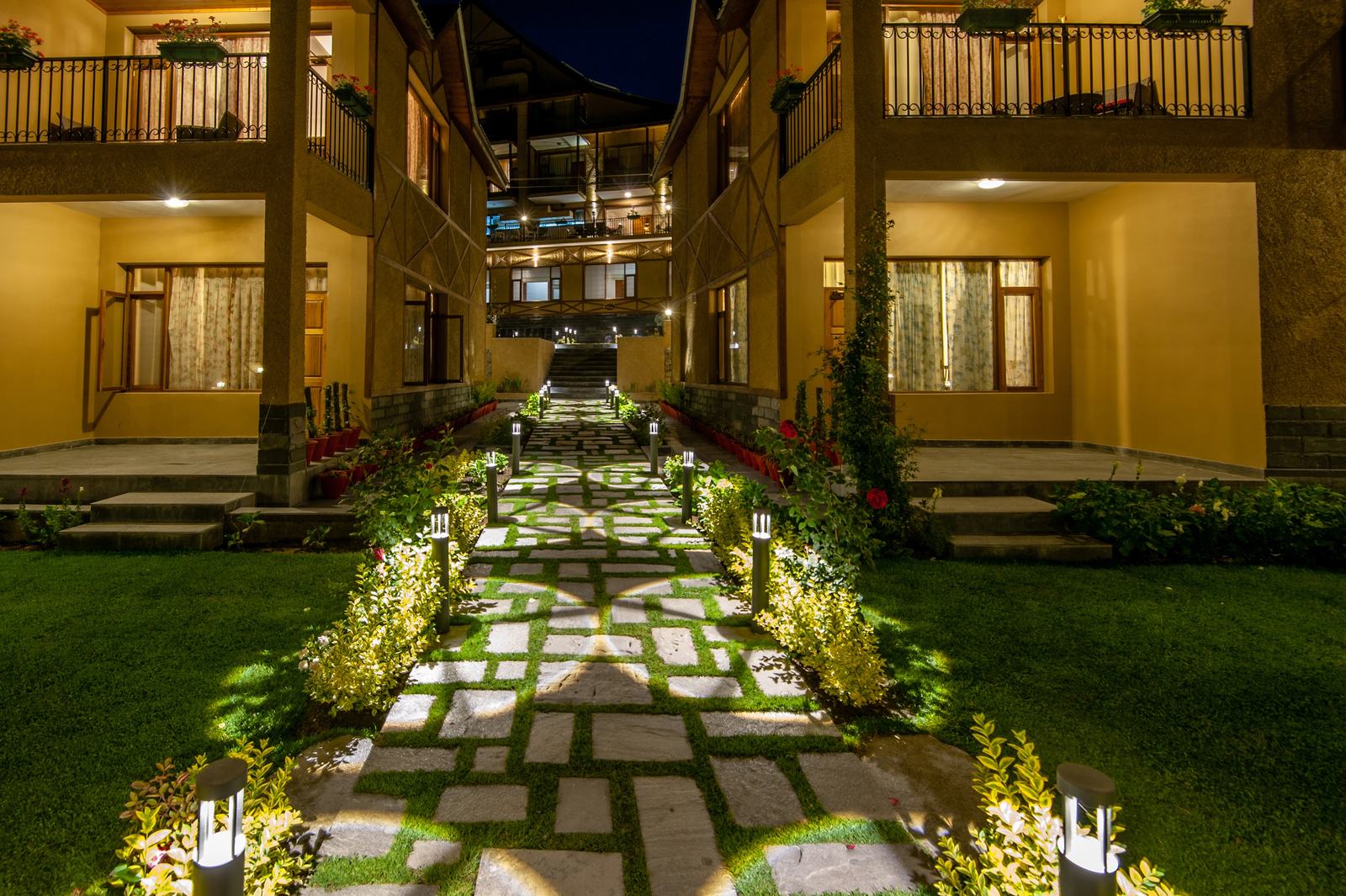 Path and villas at night