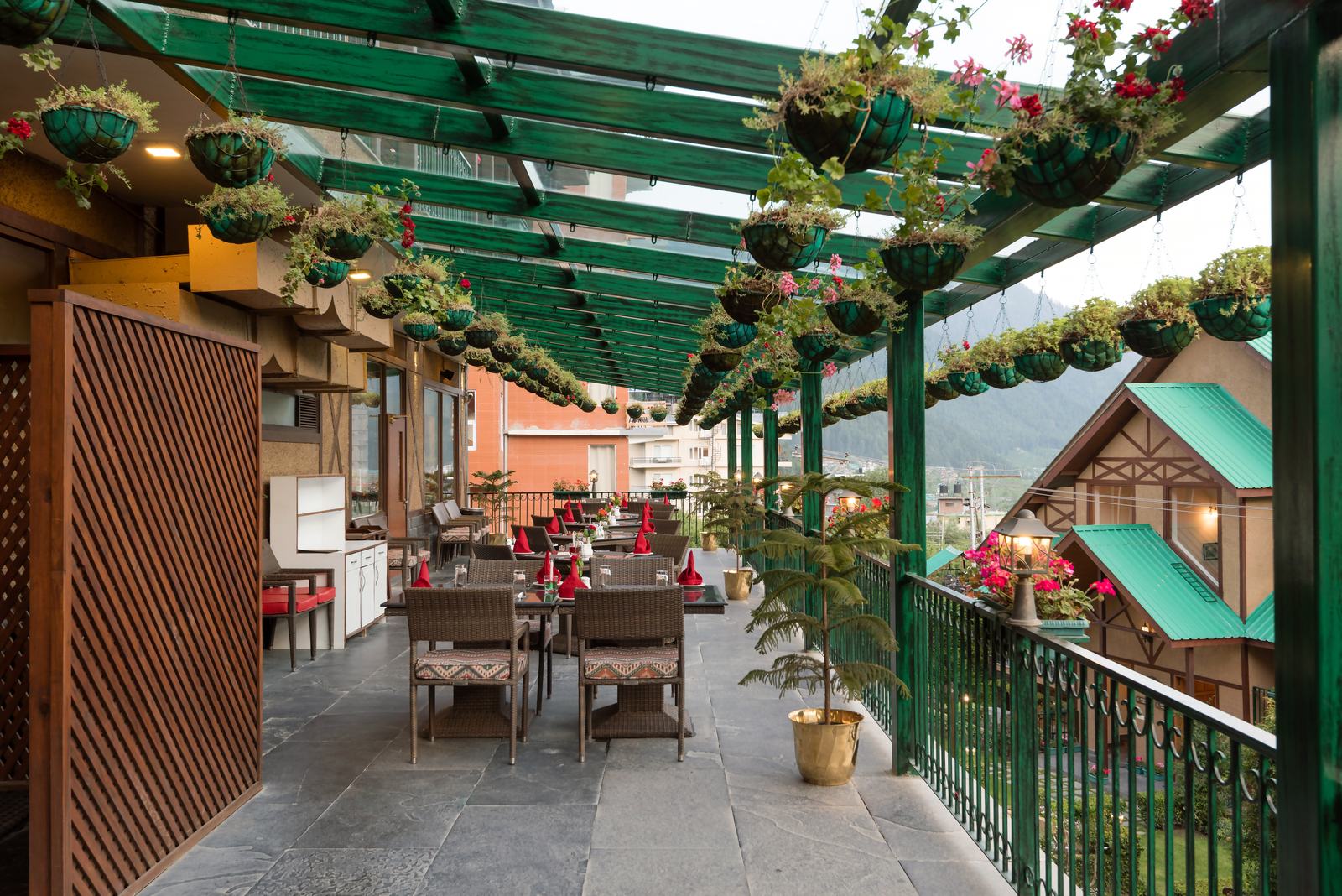 Covered patio with hanging flower baskets